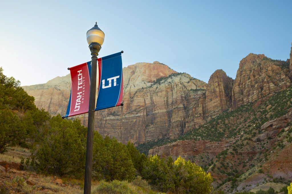 Flags in front of mountains.