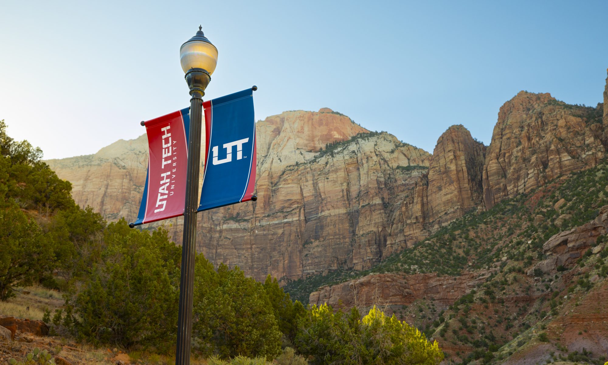 Flags in front of mountains.